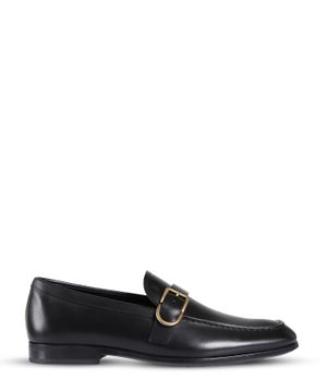 Black leather loafers with metal detail