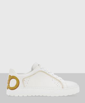 White sneakers with shiny logo