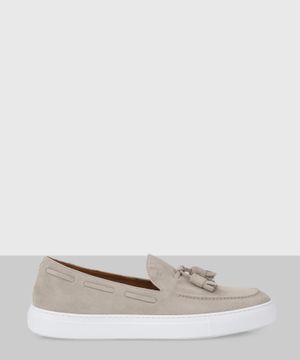 Beige slip-on shoes with fringed detail