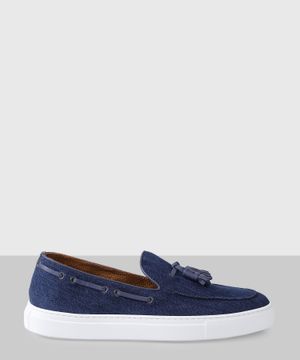 Blue slip-on shoes with fringed detail
