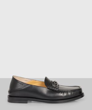 Black loafers with metal detail 