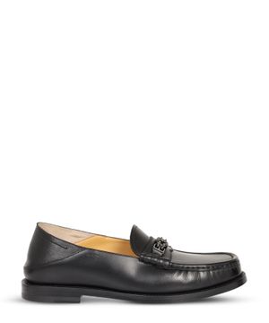 Black loafers with metal detail 