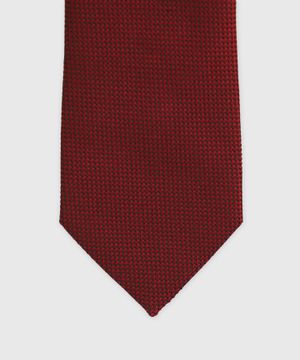 Red tie with pattern print