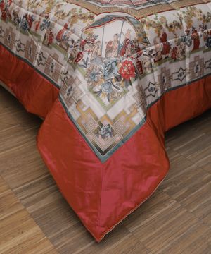 Ornamental print quilted bedcover