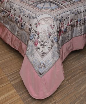Ornamental print quilted bedcover