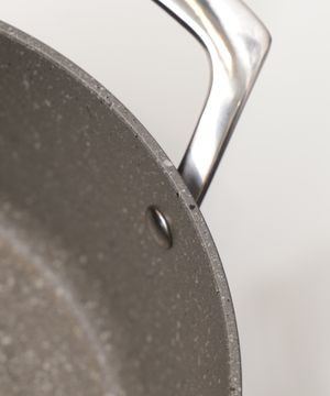 Non stick pan with steamer insert