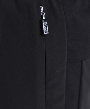 Water-repellent tracksuit bottoms with zipped hems