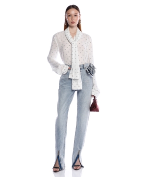 Denim pants with zipped hem and flower detail