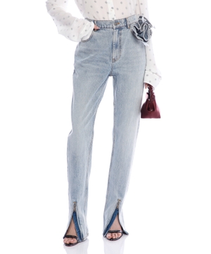 Denim pants with zipped hem and flower detail