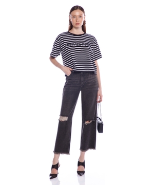 Cropped jeans with fringes