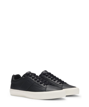 Trainers with plain and grained textures