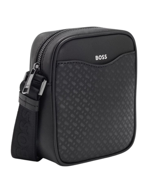 Reporter bag with monogram-patterned front pocket