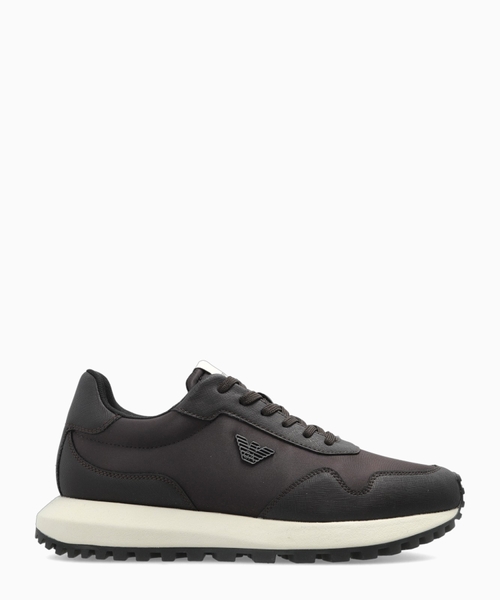 Sneakers with metal logo