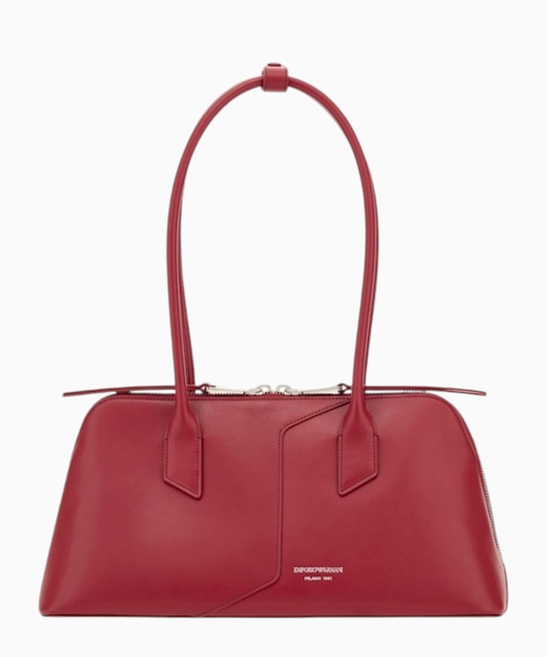 Handbag in leather with top handles and a zip closure