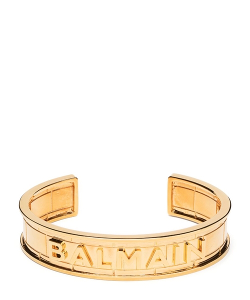 Браслет с деталью в виде логотипа