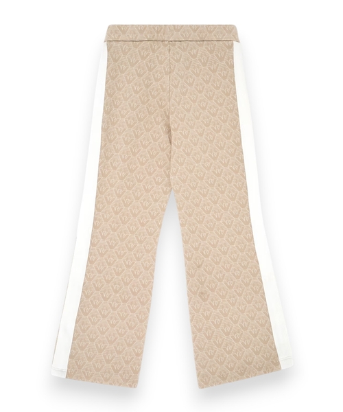 Flared trousers in all-over eagle jacquard jersey