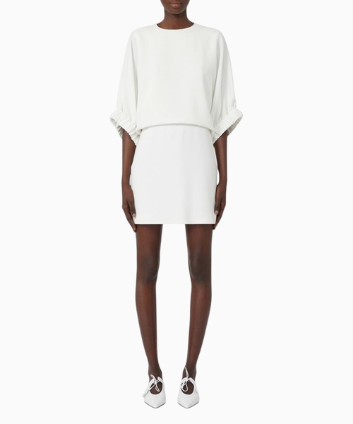 Short dress with a deep slit on the back