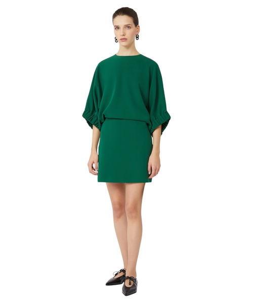 Short dress with a deep slit on the back